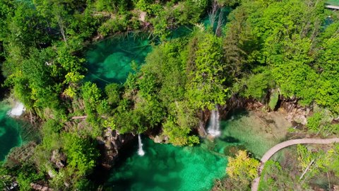 Aerial View Of Plitvice Lakes And Waterfalls. Pedestal Down, Tilt Up