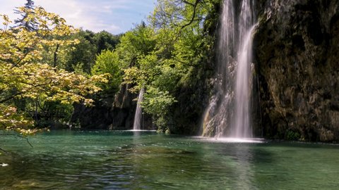 Tilt Down Time lapse View Of Cascading Waterfalls At Plitvice Lakes