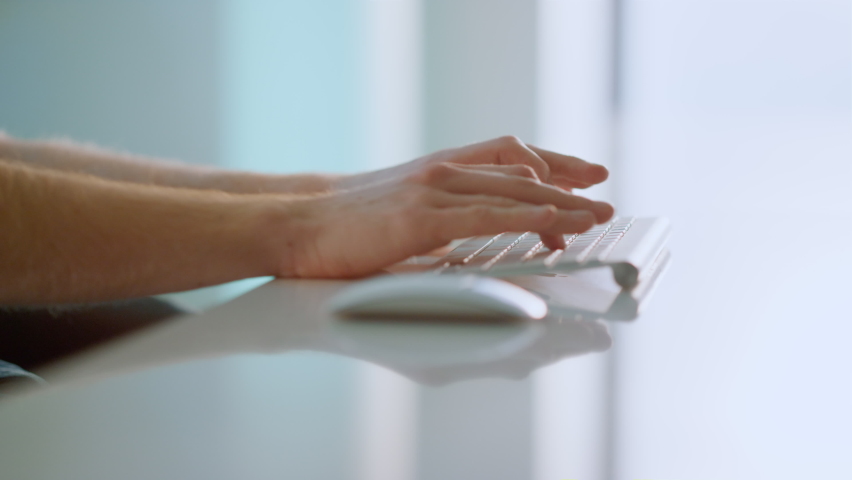 Worker hands holding mouse using wireless device at bright home office closeup. Unknown business analyst professional typing keyboard analyzing data creating report. Businessman work desktop computer. - Powered by Shutterstock - Get 15% off with code: PIKWIZARD15