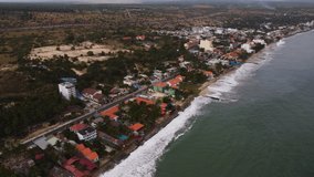 Aerial, climate change rising sea levels eroding coastal Southeast Asia village - Powered by Shutterstock - Get 15% off with code: PIKWIZARD15