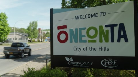 Oneonta, New York, USA - 05-23-2002: Welcome to Oneonta City of the Hills Sign Closeup