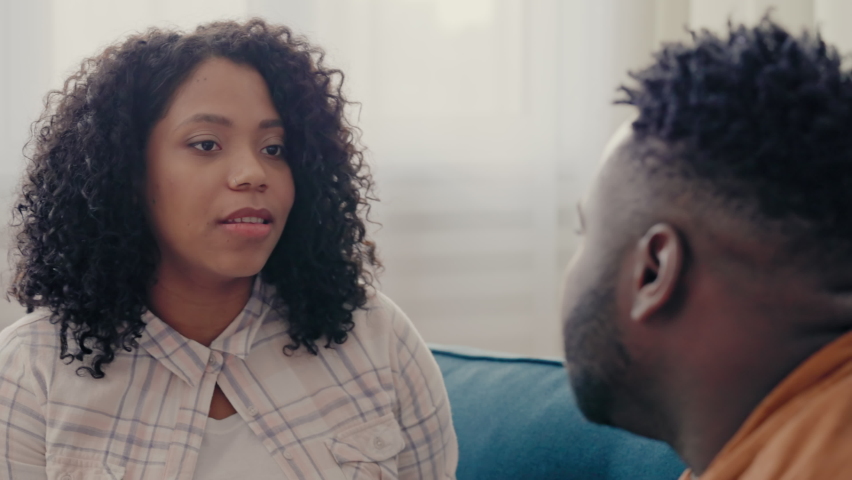 Displeased African American woman arguing with husband, relationship crisis | Shutterstock HD Video #1090903775