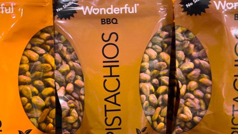 Augusta, Ga USA - 05 23 22:  Wonderful brand pistachios in various flavors on a retail shelfmp4.