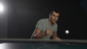 table tennis. man a athlete playing ping pong. sport party tournament concept. sportsman man lifestyle training playing table tennis. forehand and backhand exercise in ping pong - Powered by Shutterstock - Get 15% off with code: PIKWIZARD15