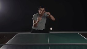 table tennis. man a athlete playing ping pong. sport party tournament concept. sportsman man training playing table tennis. forehand and backhand exercise lifestyle in ping pong - Powered by Shutterstock - Get 15% off with code: PIKWIZARD15