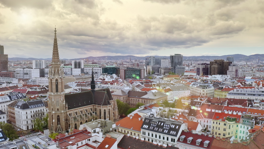 Top view aerial footage from flying drone of historical part municipality capital city Vienna in Austria baroque architecture with red rooftops catholic church cathedral viennese Stephansplatz square Royalty-Free Stock Footage #1090926719