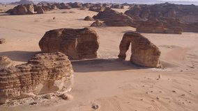 Elephant Rock, Jabal Alfil, Al Ula, Saudi Arabia. High quality aerial view drone video. Unesco World Heritage site. A landscape of sand, rocks and tombs. Now a tourism attraction.