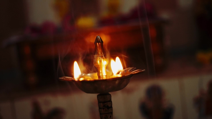 Hindu Prayer Rituals, Close up of glowing oil lamp in hindu temple, Spiritual background - Selective focused Royalty-Free Stock Footage #1090929189