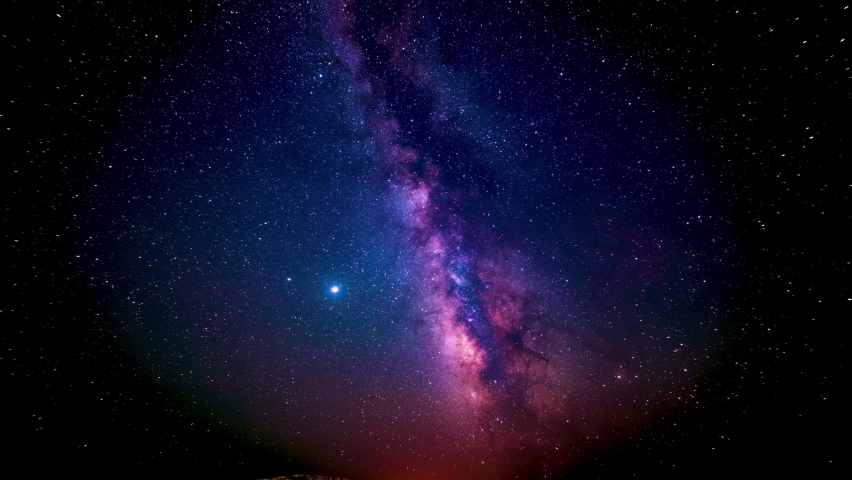 The zodiac sign Sagittarius according to the horoscope is drawn using luminous lines in the cosmic starry sky of the galaxy. The zodiac sign is gradually drawn, imitating a pencil, and then shaded.