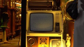 an old television opened in the vintage shop