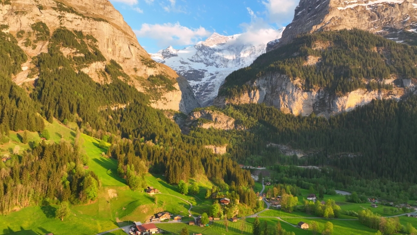 famous Swiss mountain valley of Grindelwald, beautiful mountain landscape in Switzerland, hiking in Jungfrau region, stunning Swiss nature.  Royalty-Free Stock Footage #1090988155