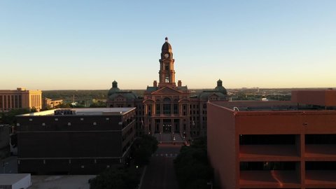 Drone footage of downtown Fort Worth, Texas Courthouse, skyscrapers and buildings at sunset