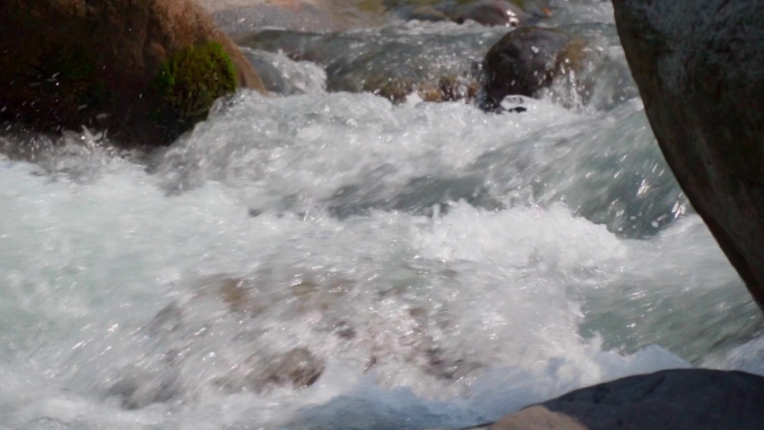 Mountain river. turbulent water flow. Himalayas, India. | Shutterstock HD Video #1091001683