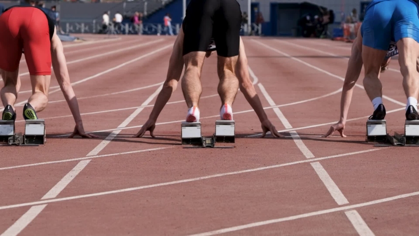 slow motion start male athletes run sprint race Royalty-Free Stock Footage #1091009735