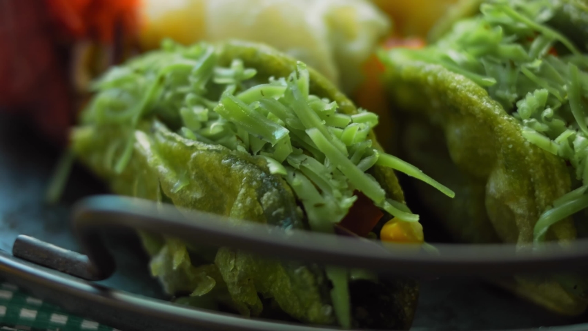 Mexican Flag TACOS. It forms the shape of the Mexican flag on a flat vessel. Macro shooting