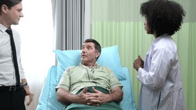 A young female doctor who specializes in heart disease. Advise patients with heart disease symptoms and the patient's son. that the results of the treatment improved until they were able to go home - Powered by Shutterstock - Get 15% off with code: PIKWIZARD15