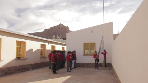 Jujuy, Argentina - March 2015: Students during the Morning flag-raising Ceremony in a Public School in Jujuy Province, Argentina.