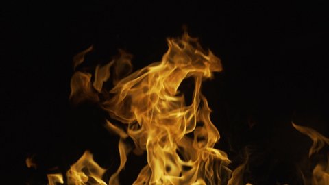 Fire flames on black background. Fire burn flame isolated, abstract texture. Glow fire effect.