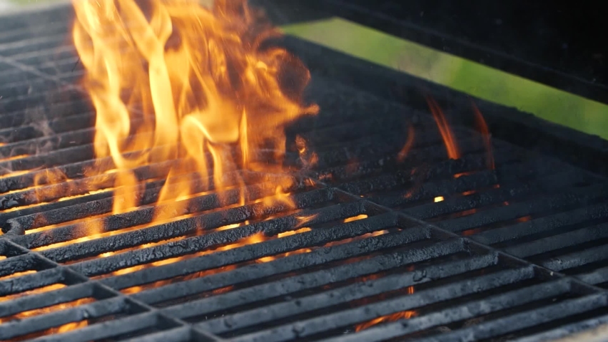 Close-up barbecue grill, slow motion night burning fire flame, cooking outdoors Royalty-Free Stock Footage #1091038583