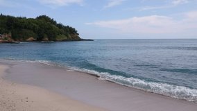 Beach view with calm waves. The beautiful Menganti Beach is suitable for relaxation and family vacations.