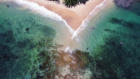 Professional video Aerial view of drone. Scene of top view beach and seawater on sandy beach in summer. Nature and travel concept. Location Phuket Thailand 
