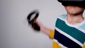 Portrait of kid VR gamer. Child in vr gadgets set, helmet and goggles. Little boy in virtual reality. - Powered by Shutterstock - Get 15% off with code: PIKWIZARD15