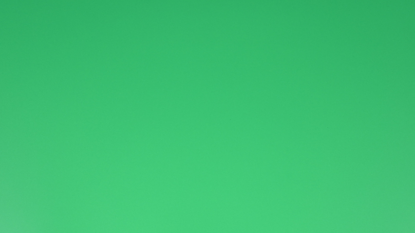 Many note paper on a green background - Stop Motion Animation.