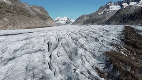 Aerial view of Great Aletsch Glacier, Alps, Switzerland. Drone footage 4K. - Powered by Shutterstock - Get 15% off with code: PIKWIZARD15