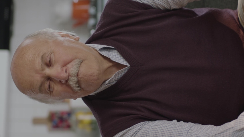 Worried, pensive, 80s old man sitting at home alone, thinking about life alone.Depressed pensive old man with health problems in old age feels lonely. Old age diseases, healthcare concept.