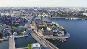 Inscription on video. Stockholm, Sweden. Old Town - Gamla Stan. Riddarholmen. Aerial view. Name is burning, Aerial View