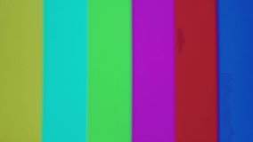 Old retro television, colorful screen close-up. Broken old-fashioned TV with noise, bad signal reception, cinematography concept. 