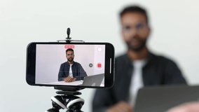 Close up shot focused phone african ethnicity male applicant holding video call