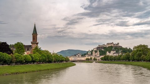 Salzburg Austria time lapse 4K, city skyline timelapse of Salzburg city and Fortress Hohensalzburg