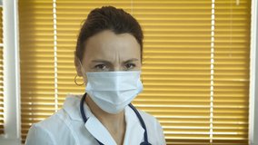 Doctor fight against spread of the virus. A professional woman doctor wear boxing gloves and fight against spread on the virus disease. - Powered by Shutterstock - Get 15% off with code: PIKWIZARD15