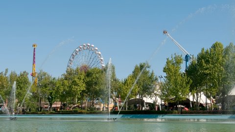 ANKARA, TURKEY, JUNE 6, 2022: Amusement Park rides at Genclik Parki, a public park with cultural center, youths' center, theme park and convention halls at the center of Ankara; capital city of Turkey