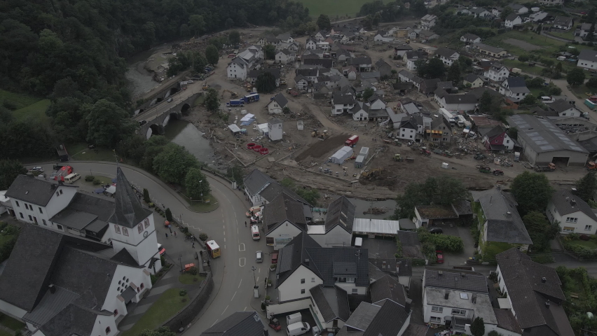 Strong flooding occurred in the Ahrweiler region in the summer of 2021, causing damage to many houses and bridges.  
The drone shows how the village "Schuld" in Rhineland-Palatinate has been affected  Royalty-Free Stock Footage #1091085565