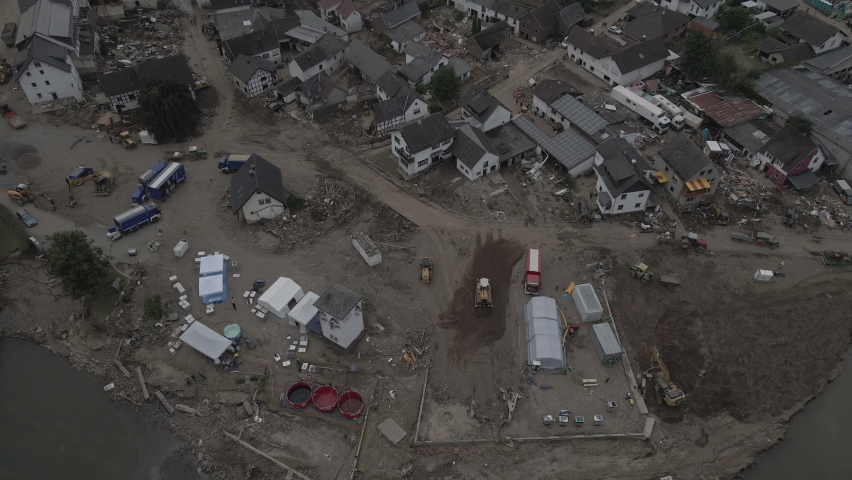 Strong flooding occurred in the Ahrweiler region in the summer of 2021, causing damage to many houses and bridges.  
The drone shows how the village "Schuld" in Rhineland-Palatinate has been affected  Royalty-Free Stock Footage #1091085571