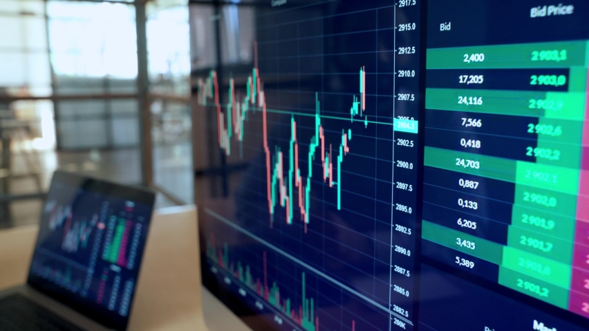 Two diverse crypto traders brokers stock exchange market investors discussing trading charts research reports growth using pc computer looking at screen analyzing invest strategy, financial profit. | Shutterstock HD Video #1091092359