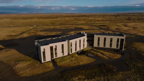 Luxury lonely hotel located in the middle of nowhere in Iceland. Amazing modern building aerial view.