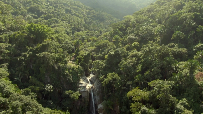 Drone Descending On Cascada de Yelapa At Rainforest In Jalisco, Mexico. Aerial Shot
