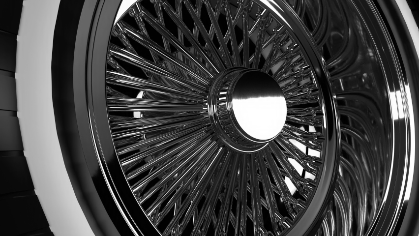 Looping Close Up View Chrome Wire Wheel With Tire Royalty-Free Stock Footage #1091105963