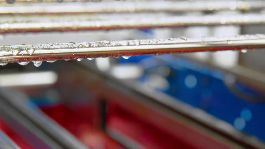 Close-up of filling cassettes with vermiculite at the factory.