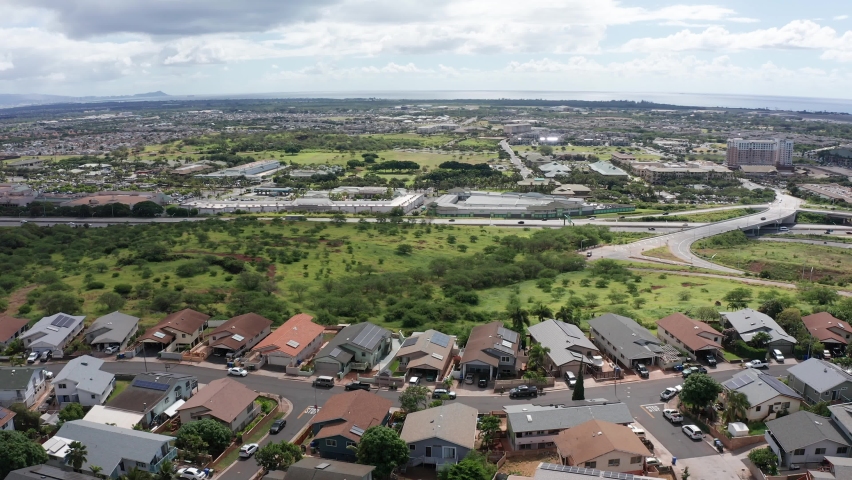 Wide panning aerial shot of the Kapolei suburbs in O