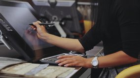 The designer draws on a graphics tablet. Working with interactive pen display. Drawing on a graphics tablet. closeup. Wallpaper production. - Powered by Shutterstock - Get 15% off with code: PIKWIZARD15