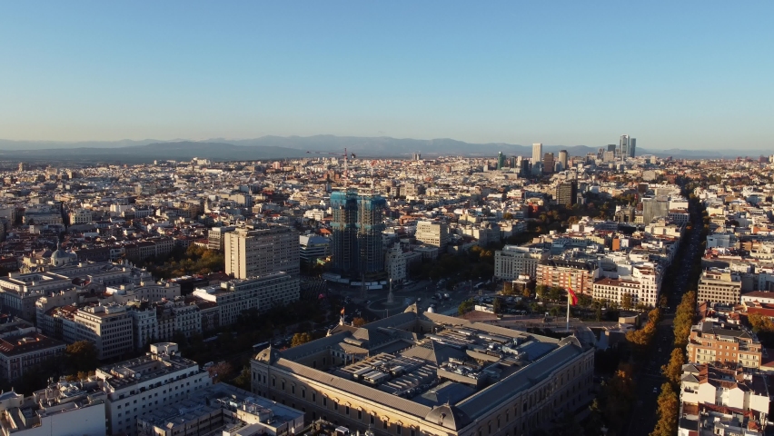 Drone view of sunny Madrid and its quarters from a bird