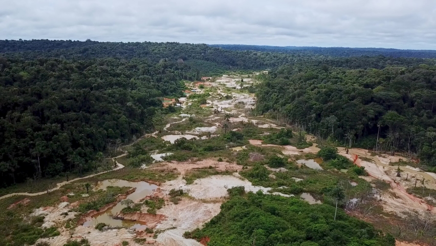 Aerial footage over the huge gold mine on the amazon. Royalty-Free Stock Footage #1091128839