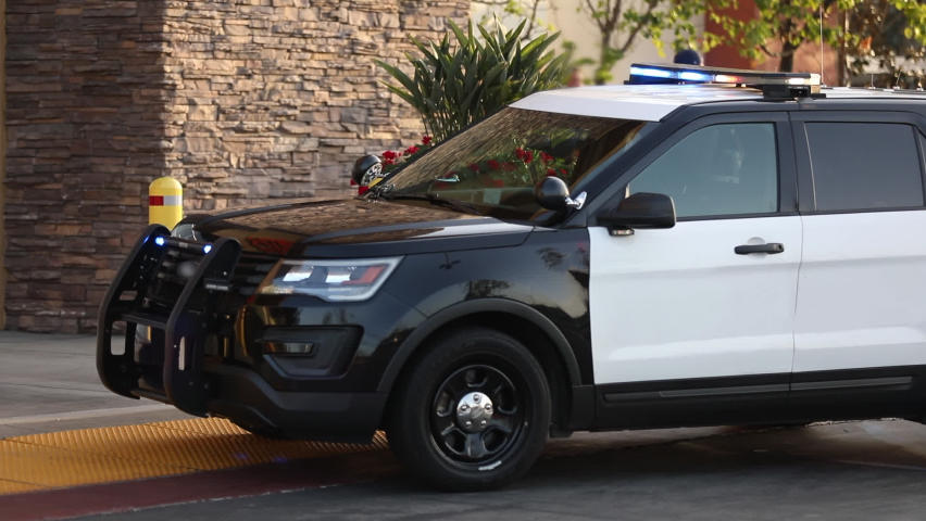 A police unit responds to the scene of an emergency.