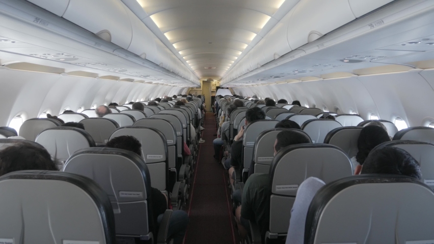 POV to the aisle pathway inside plane cabin Royalty-Free Stock Footage #1091140801