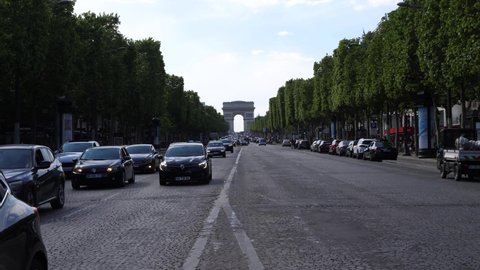 PARIS, FRANCE - MAY 15 2022: View of cars on the Champs Elysees