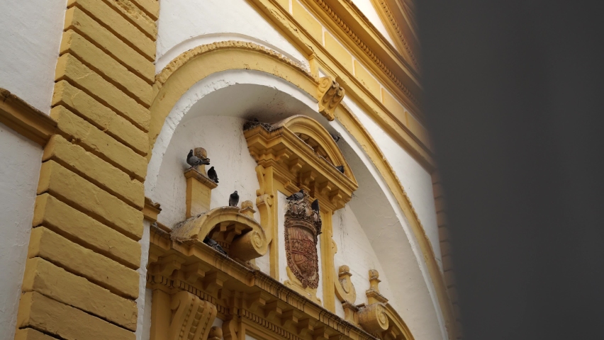 Church with yellow architectural elements. Utrera Church. Utrera. Towns of Seville, Spain-